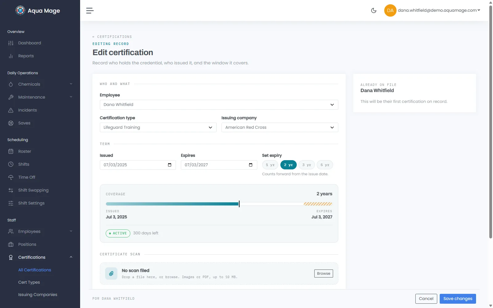 The Aqua Mage certificate designer mid-edit, with a name field selected and drag handles showing over a certificate background carrying a facility logo